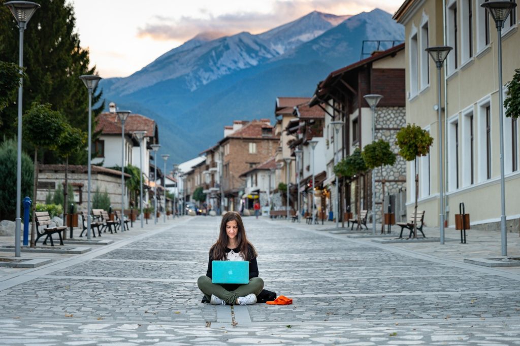 A digital nomad working on the streets