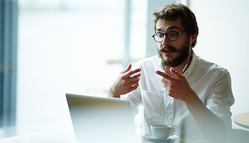 A man on a virtual interview