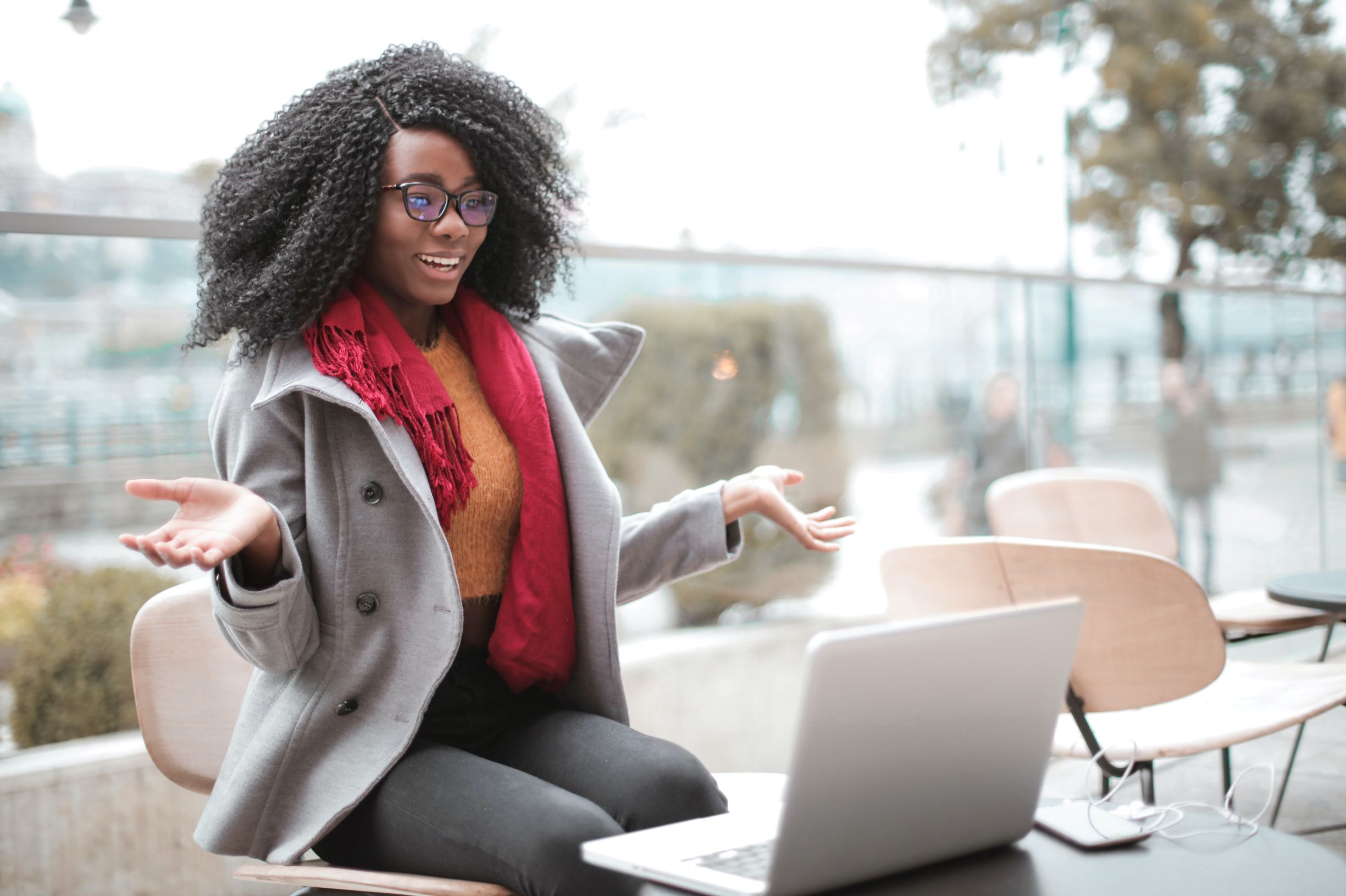 A woman on a video call on her laptop